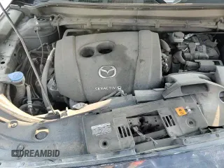 ✅ 2020 Mazda CX-5 Touring • VIN: JM3KFACM2L0769347 • Lot: 80555015. Listed on Copart with 129,266 mi. Free auction sales archive from the USA and detailed vehicle history report at DreamBid. Image 16.