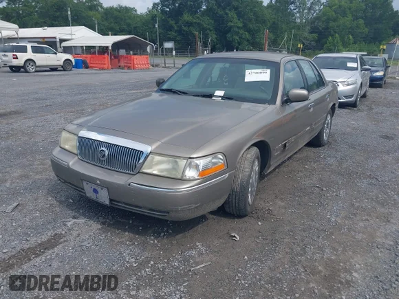 ✅ 2003 Mercury Grand Marquis GS Convenience • VIN: 2MEFM74W73X640765 • Lot: 42700099. Wystawiony na IAAI z przebiegiem 121 617 mil. Bezpłatny archiwum sprzedaży aukcyjnych z USA i szczegółowy raport historii pojazdu na DreamBid. Zdjęcie 2.