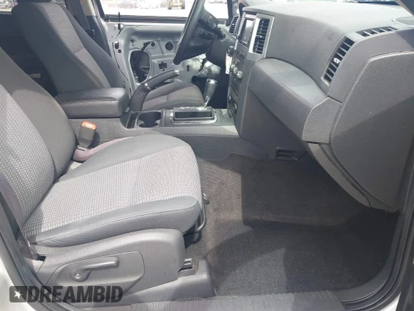 ✅ 2009 Jeep Grand Cherokee Laredo • VIN: 1J8GS48K69C555853 • Lot: 45264476. Listed on IAAI with 293,487 mi. Free auction sales archive from the USA and detailed vehicle history report at DreamBid. Image 5.