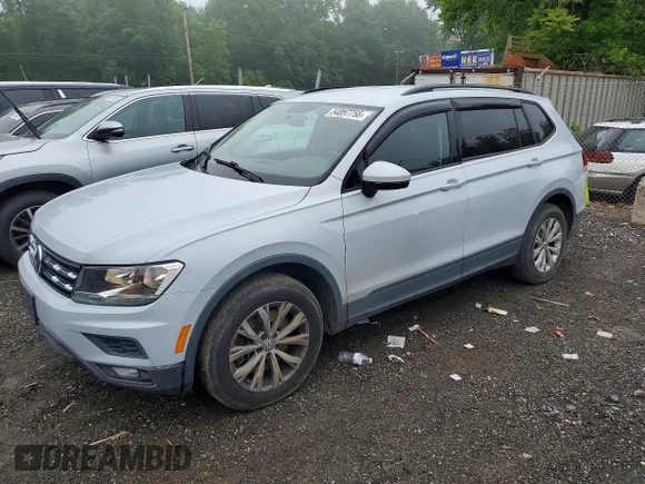 ✅ 2018 Volkswagen Tiguan S • VIN: 3VV1B7AX1JM015268 • Lot: 54897756. Listed on Copart with 97,424 mi. Free auction sales archive from the USA and detailed vehicle history report at DreamBid. Image 1.