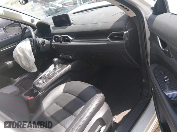 ✅ 2021 Mazda CX-5 Grand Touring • VIN: JM3KFBDM5M0468223 • Lot: 44839982. Wystawiony na IAAI z przebiegiem 50 043 mil. Bezpłatny archiwum sprzedaży aukcyjnych z USA i szczegółowy raport historii pojazdu na DreamBid. Zdjęcie 5.