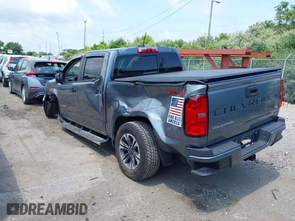 ✅ 2022 Chevrolet Colorado 2WD Z71 • VIN: 1GCGSDEN0N1115008 • Lot: 42743455. Listed on IAAI with 26,849 mi. Free auction sales archive from the USA and detailed vehicle history report at DreamBid. Image 3.