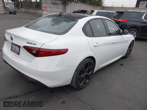 ✅ 2020 Alfa Romeo Giulia • VIN: ZARFAMAN4L7632185 • Lot: 43609874. Listed on IAAI with 36,464 mi. Free auction sales archive from the USA and detailed vehicle history report at DreamBid. Image 4.