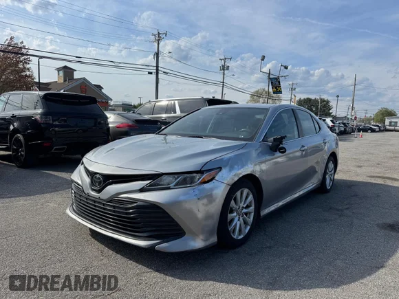 ✅ 2019 Toyota Camry LE • VIN: 4T1B11HK0KU196501 • Lot: 45113013. Wystawiony na IAAI z przebiegiem 166 443 mil. Bezpłatny archiwum sprzedaży aukcyjnych z USA i szczegółowy raport historii pojazdu na DreamBid. Zdjęcie 2.