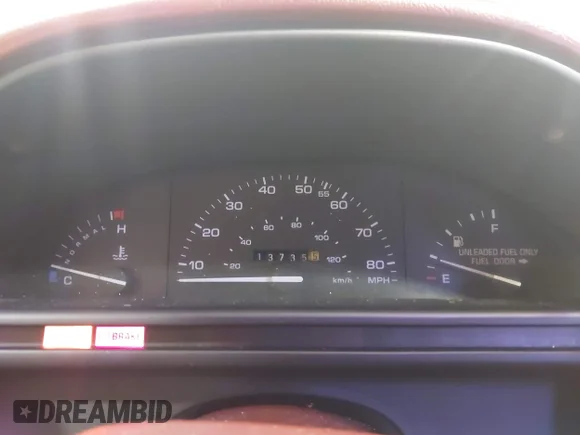 ✅ 1992 Ford Tempo • VIN: 1FAPP36X0NK130278 • Lot: 42926859. Wystawiony na IAAI z przebiegiem 13 735 mil. Bezpłatny archiwum sprzedaży aukcyjnych z USA i szczegółowy raport historii pojazdu na DreamBid. Zdjęcie 7.
