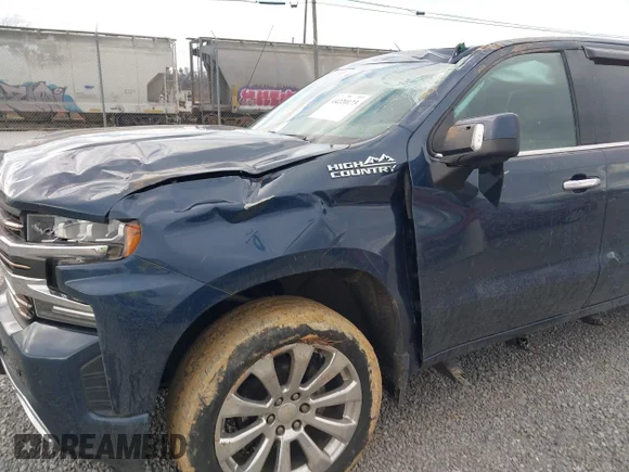 ✅ 2020 Chevrolet Silverado 1500 High Country • VIN: 3GCUYHED0LG253842 • Lot: 44220173. Wystawiony na IAAI z przebiegiem 74 606 mil. Bezpłatny archiwum sprzedaży aukcyjnych z USA i szczegółowy raport historii pojazdu na DreamBid. Zdjęcie 6.