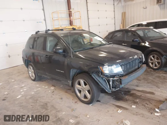 ✅ 2014 Jeep Compass High Altitude • VIN: 1C4NJCEA8ED785728 • Lot: 43438003. Wystawiony na IAAI z przebiegiem 170 959 mil. Bezpłatny archiwum sprzedaży aukcyjnych z USA i szczegółowy raport historii pojazdu na DreamBid. Zdjęcie 1.
