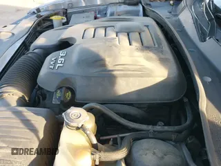 ✅ 2014 Dodge Charger SXT • VIN: 2C3CDXHG9EH124979 • Lot: 43699205. Listed on IAAI with 159,978 mi. Free auction sales archive from the USA and detailed vehicle history report at DreamBid. Image 19.