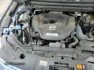 ✅ 2021 Mazda CX-5 Grand Touring Reserve • VIN: JM3KFBAY9M0405018 • Lot: 82329145. Listed on Copart with 46,410 mi. Free auction sales archive from the USA and detailed vehicle history report at DreamBid. Image 13.