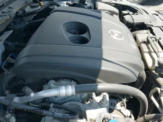 ✅ 2016 Mazda 3 i Grand Touring • VIN: JM1BM1X75G1305715 • Лот: 42240616. Опубликован ранее на IAAI с пробегом 65 400 миль. Бесплатный доступ к архиву аукционных продаж из США и подробный отчёт об истории автомобиля на DreamBid. Изображение 19.