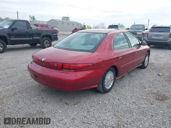 ✅ 1999 Mercury Sable GS • VIN: 1MEFM50U4XG622650 • Лот: 42099721. Опубліковано раніше на IAAI з пробігом 86 899 миль. Безкоштовний доступ до архіву аукціонних продажів зі США та докладний звіт про історію автомобіля на DreamBid. Зображення 4.