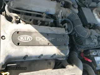 ✅ 2001 Kia Sephia • VIN: KNAFB121215087076 • Лот: 42163003. Опубликован ранее на IAAI с пробегом 203 333 миль. Бесплатный доступ к архиву аукционных продаж из США и подробный отчёт об истории автомобиля на DreamBid. Изображение 19.