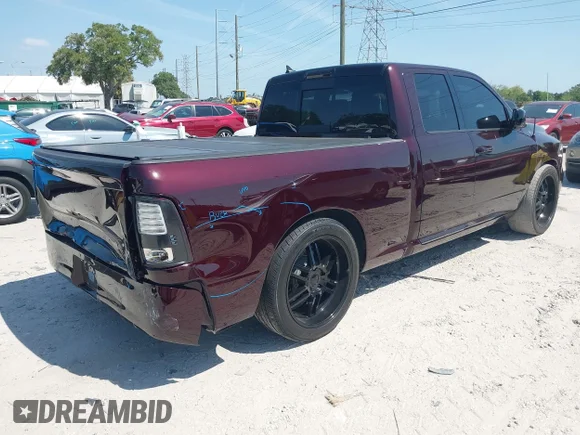✅ 2014 Ram 1500 Sport • VIN: 1C6RR6HT5ES458201 • Лот: 42082640. Опубліковано раніше на IAAI з пробігом 97 730 миль. Безкоштовний доступ до архіву аукціонних продажів зі США та докладний звіт про історію автомобіля на DreamBid. Зображення 4.