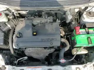 ✅ 2006 Suzuki Aerio Premium • VIN: JS2RC62H065351383 • Lot: 82933084. Wystawiony na Copart z przebiegiem 80 771 mil. Bezpłatny archiwum sprzedaży aukcyjnych z USA i szczegółowy raport historii pojazdu na DreamBid. Zdjęcie 13.