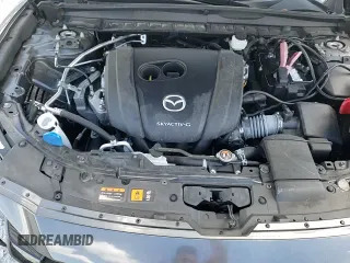 ✅ 2023 Mazda CX-50 S Premium Plus • VIN: 7MMVABEM8PN136223 • Lot: 71307085. Listed on Copart with 22,401 mi. Free auction sales archive from the USA and detailed vehicle history report at DreamBid. Image 14.