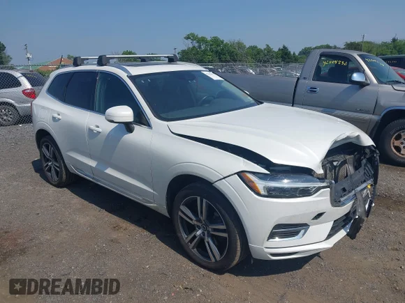 ✅ 2021 Volvo XC60 Inscription Expression • VIN: YV4BR0DK7M1820423 • Lot: 42381071. Listed on IAAI with 66,663 mi. Free auction sales archive from the USA and detailed vehicle history report at DreamBid. Image 1.