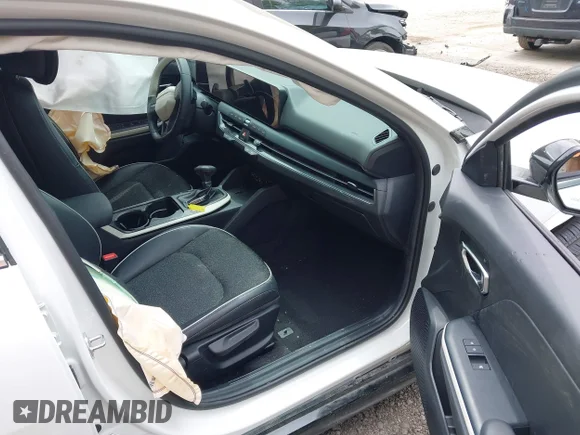 ✅ 2025 Kia K4 GT-Line • VIN: 3KPFW4DEXSE044958 • Lot: 42199877. Listed on IAAI with 3,336 mi. Free auction sales archive from the USA and detailed vehicle history report at DreamBid. Image 5.
