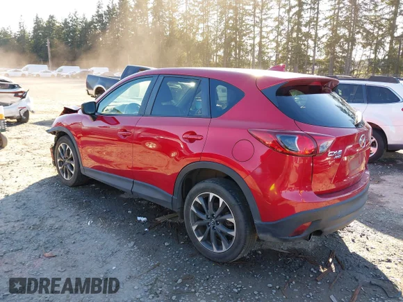 ✅ 2016 Mazda CX-5 Grand Touring • VIN: JM3KE4DY3G0773001 • Лот: 44496119. Опубліковано раніше на IAAI з пробігом 82 218 миль. Безкоштовний доступ до архіву аукціонних продажів зі США та докладний звіт про історію автомобіля на DreamBid. Зображення 3.