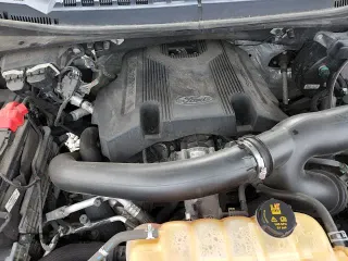 ✅ 2018 Ford F-150 Platinum • VIN: 1FTFW1EG0JFE51450 • Lot: 91217995. Wystawiony na Copart z przebiegiem 99 871 mil. Bezpłatny archiwum sprzedaży aukcyjnych z USA i szczegółowy raport historii pojazdu na DreamBid. Zdjęcie 13.