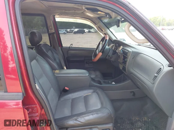 ✅ 2004 Ford Explorer Sport Trac XLS • VIN: 1FMZU77KX4UA69977 • Lot: 42453038. Listed on IAAI with 211,580 mi. Free auction sales archive from the USA and detailed vehicle history report at DreamBid. Image 5.