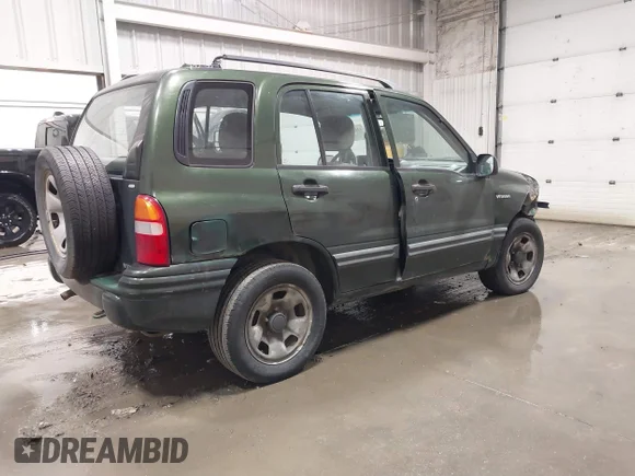 ✅ 2000 Suzuki Vitara JX • VIN: 2S3TD52V7Y6105596 • Lot: 43284298. Wystawiony na IAAI z przebiegiem 122 596 mil. Bezpłatny archiwum sprzedaży aukcyjnych z USA i szczegółowy raport historii pojazdu na DreamBid. Zdjęcie 4.