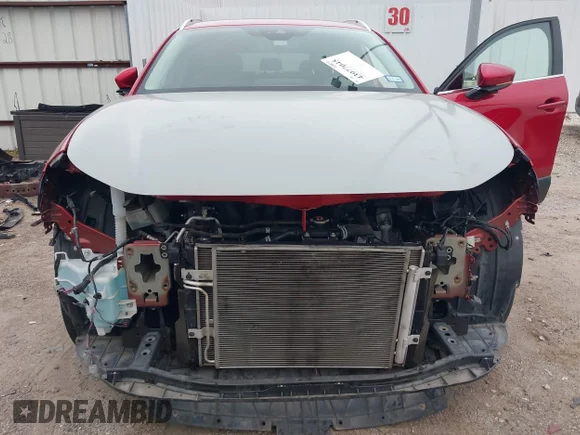 ✅ 2020 Mazda CX-30 Premium • VIN: 3MVDMAEM7LM118506 • Лот: 43977045. Опубліковано раніше на IAAI з пробігом 66 647 миль. Безкоштовний доступ до архіву аукціонних продажів зі США та докладний звіт про історію автомобіля на DreamBid. Зображення 6.