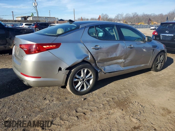 ✅ 2012 Kia Optima EX • VIN: 5XXGN4A70CG083273 • Lot: 99754605. Wystawiony na Copart z przebiegiem 162 087 mil. Bezpłatny archiwum sprzedaży aukcyjnych z USA i szczegółowy raport historii pojazdu na DreamBid. Zdjęcie 3.