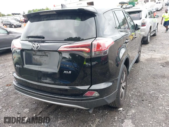 ✅ 2018 Toyota RAV4 XLE • VIN: 2T3WFREV8JW472316 • Лот: 45386504. Опубликован ранее на IAAI с пробегом 100 763 миль. Бесплатный доступ к архиву аукционных продаж из США и подробный отчёт об истории автомобиля на DreamBid. Изображение 4.