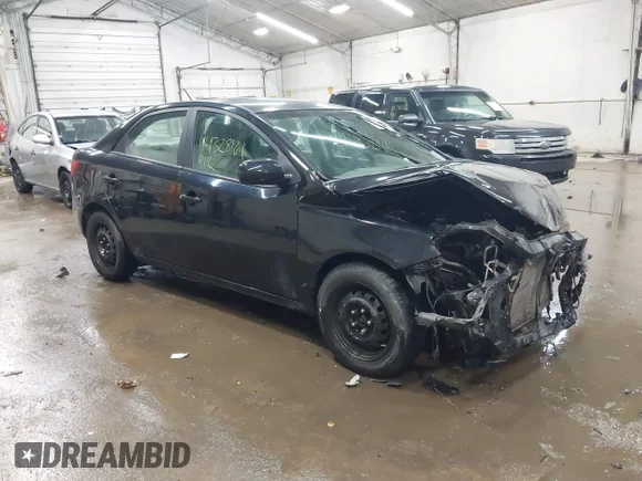 ✅ 2012 Kia Forte LX • VIN: KNAFT4A21C5486122 • Lot: 44328161. Listed on IAAI with 116,427 mi. Free auction sales archive from the USA and detailed vehicle history report at DreamBid. Image 1.