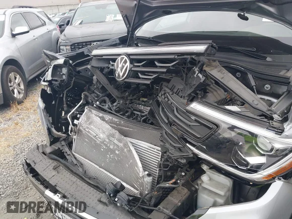 ✅ 2024 Volkswagen Atlas SE • VIN: 1V2JE2CAXRC220052 • Lot: 45104483. Wystawiony na IAAI z przebiegiem 8 982 mil. Bezpłatny archiwum sprzedaży aukcyjnych z USA i szczegółowy raport historii pojazdu na DreamBid. Zdjęcie 6.