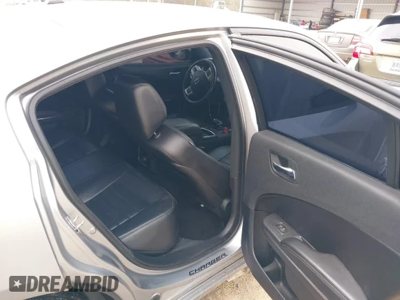 ✅ 2013 Dodge Charger SXT Plus • VIN: 2C3CDXHG8DH575710 • Lot: 41160540. Listed on IAAI with 132,540 mi. Free auction sales archive from the USA and detailed vehicle history report at DreamBid. Image 8.