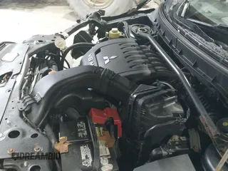 ✅ 2010 Mitsubishi Outlander XLS • VIN: JA4JT4AX3AZ005165 • Lot: 41671155. Listed on IAAI with 192,405 mi. Free auction sales archive from the USA and detailed vehicle history report at DreamBid. Image 14.