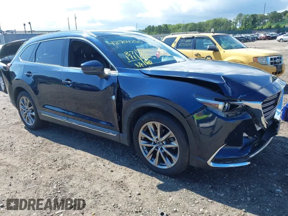 ✅ 2019 Mazda CX-9 Grand Touring • VIN: JM3TCBDY6K0335886 • Lot: 42704250. Wystawiony na IAAI z przebiegiem 37 171 mil. Bezpłatny archiwum sprzedaży aukcyjnych z USA i szczegółowy raport historii pojazdu na DreamBid. Zdjęcie 1.