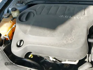 ✅ 2012 Chrysler 200 Touring • VIN: 1C3CCBBG5CN230462 • Лот: 43761639. Опубликован ранее на IAAI с пробегом 107 177 миль. Бесплатный доступ к архиву аукционных продаж из США и подробный отчёт об истории автомобиля на DreamBid. Изображение 13.