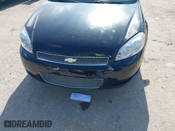 ✅ 2013 Chevrolet Impala LS • VIN: 2G1WA5E3XD1120124 • Lot: 42360600. Listed on IAAI with 77,081 mi. Free auction sales archive from the USA and detailed vehicle history report at DreamBid. Image 6.