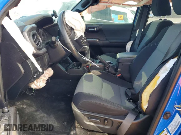 ✅ 2020 Toyota Tacoma SR5 • VIN: 3TMAZ5CN0LM132465 • Lot: 99373875. Wystawiony na Copart z przebiegiem 127 051 mil. Bezpłatny archiwum sprzedaży aukcyjnych z USA i szczegółowy raport historii pojazdu na DreamBid. Zdjęcie 7.