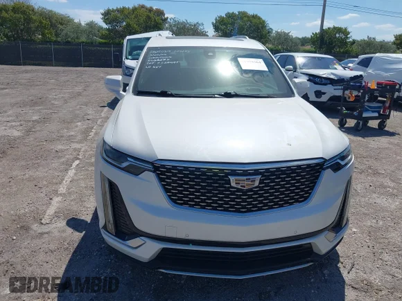 ✅ 2020 Cadillac XT6 FWD Premium Luxury • VIN: 1GYKPCRS1LZ228982 • Лот: 41975364. Опубліковано раніше на IAAI з пробігом 84 803 миль. Безкоштовний доступ до архіву аукціонних продажів зі США та докладний звіт про історію автомобіля на DreamBid. Зображення 6.