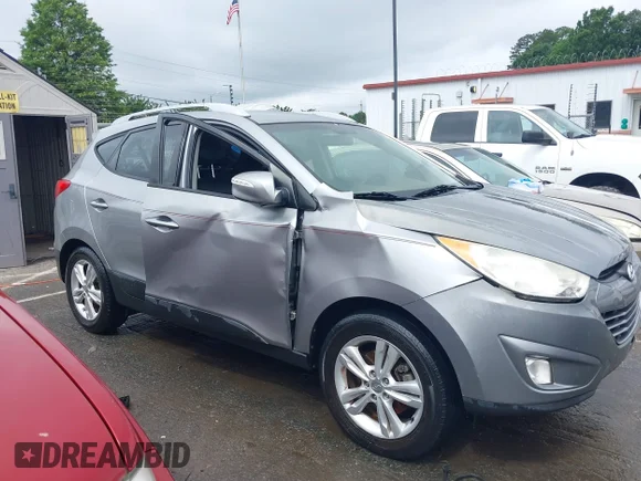 ✅ 2013 Hyundai Tucson GLS • VIN: KM8JU3AC7DU732896 • Lot: 45184257. Listed on IAAI with 116,103 mi. Free auction sales archive from the USA and detailed vehicle history report at DreamBid. Image 6.