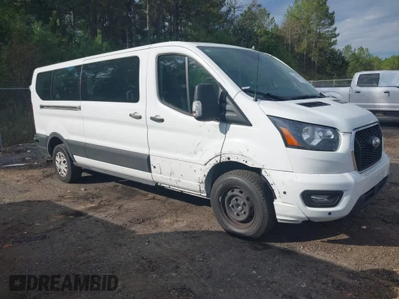 ✅ 2024 Ford Transit Passenger XL • VIN: 1FBAX2Y89RKA16922 • Lot: 43476305. Listed on IAAI with 23,254 mi. Free auction sales archive from the USA and detailed vehicle history report at DreamBid. Image 1.