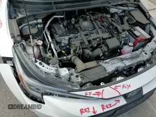 ✅ 2024 Toyota Corolla Hybrid LE • VIN: JTDBCMFE5R3048521 • Lot: 93053425. Wystawiony na Copart z przebiegiem 60 948 mil. Bezpłatny archiwum sprzedaży aukcyjnych z USA i szczegółowy raport historii pojazdu na DreamBid. Zdjęcie 13.