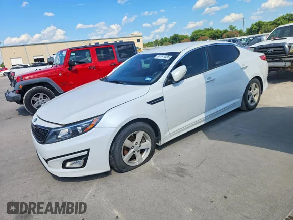 ✅ 2015 Kia Optima LX • VIN: KNAGM4A78F5559956 • Lot: 60141036. Wystawiony na Copart z przebiegiem 107 187 mil. Bezpłatny archiwum sprzedaży aukcyjnych z USA i szczegółowy raport historii pojazdu na DreamBid. Zdjęcie 1.