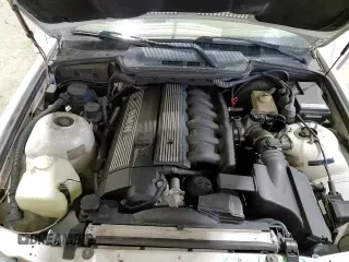 ✅ 1997 BMW 3 Series • VIN: WBABK7322VET62377 • Lot: 83114434. Listed on Copart with 201,696 mi. Free auction sales archive from the USA and detailed vehicle history report at DreamBid. Image 14.