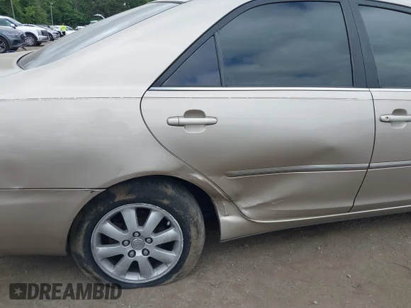 ✅ 2002 Toyota Camry XLE • VIN: JTDBF30K720005418 • Лот: 45295333. Опубликован ранее на IAAI с пробегом 291 347 миль. Бесплатный доступ к архиву аукционных продаж из США и подробный отчёт об истории автомобиля на DreamBid. Изображение 6.
