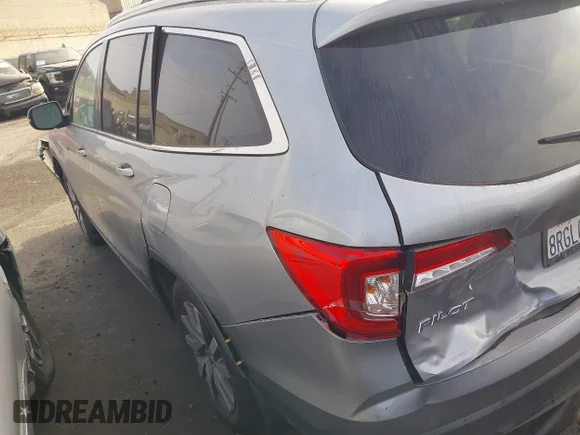 ✅ 2020 Honda Pilot EX-L • VIN: 5FNYF5H52LB019623 • Lot: 44220614. Listed on IAAI with 63,779 mi. Free auction sales archive from the USA and detailed vehicle history report at DreamBid. Image 3.