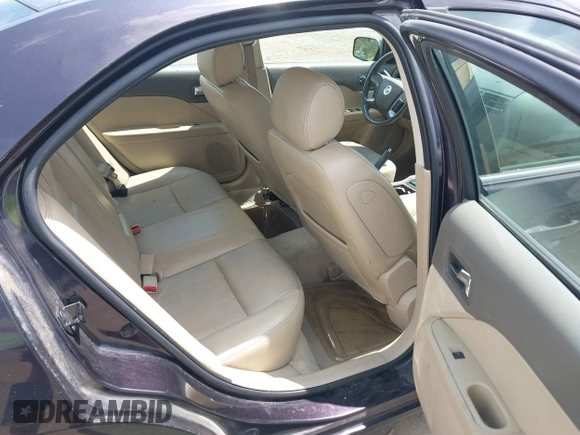 ✅ 2007 Mercury Milan Premier • VIN: 3MEHM02107R613757 • Lot: 42732989. Wystawiony na IAAI z przebiegiem 130 400 mil. Bezpłatny archiwum sprzedaży aukcyjnych z USA i szczegółowy raport historii pojazdu na DreamBid. Zdjęcie 8.