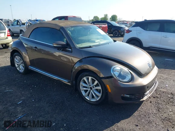 ✅ 2015 Volkswagen Beetle 2.0L TDI • VIN: 3VW5A7AT8FM818972 • Лот: 41966746. Опубліковано раніше на IAAI з пробігом 144 699 миль. Безкоштовний доступ до архіву аукціонних продажів зі США та докладний звіт про історію автомобіля на DreamBid. Зображення 1.