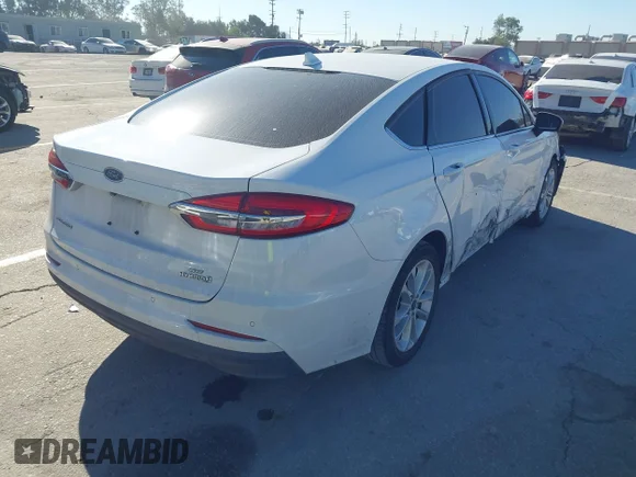 ✅ 2019 Ford Fusion SE • VIN: 3FA6P0LU5KR200207 • Lot: 44629717. Listed on IAAI with 77,041 mi. Free auction sales archive from the USA and detailed vehicle history report at DreamBid. Image 4.