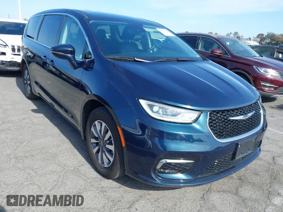 ✅ 2022 Chrysler Pacifica Hybrid Touring L • VIN: 2C4RC1L76NR184225 • Лот: 45277567. Опубліковано раніше на IAAI з пробігом 130 248 миль. Безкоштовний доступ до архіву аукціонних продажів зі США та докладний звіт про історію автомобіля на DreamBid. Зображення 1.