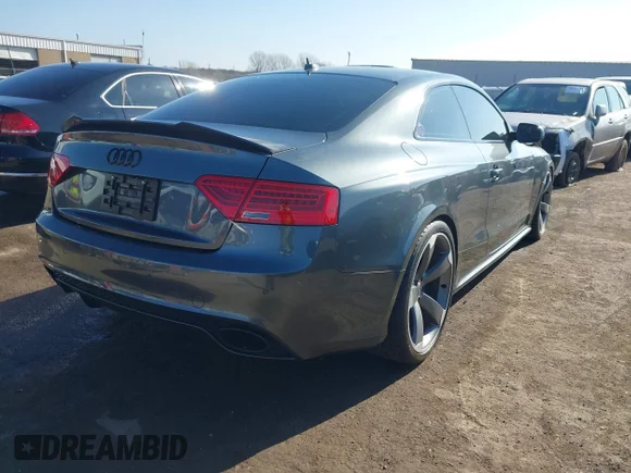 ✅ 2014 Audi RS 5 • VIN: WUAC6AFR4EA900251 • Lot: 44531830. Listed on IAAI with 60,070 mi. Free auction sales archive from the USA and detailed vehicle history report at DreamBid. Image 4.