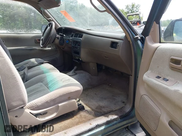 ✅ 1997 Toyota T100 SR5 • VIN: JT4UN24D7V0038506 • Lot: 42314309. Wystawiony na IAAI z przebiegiem 279 902 mil. Bezpłatny archiwum sprzedaży aukcyjnych z USA i szczegółowy raport historii pojazdu na DreamBid. Zdjęcie 5.